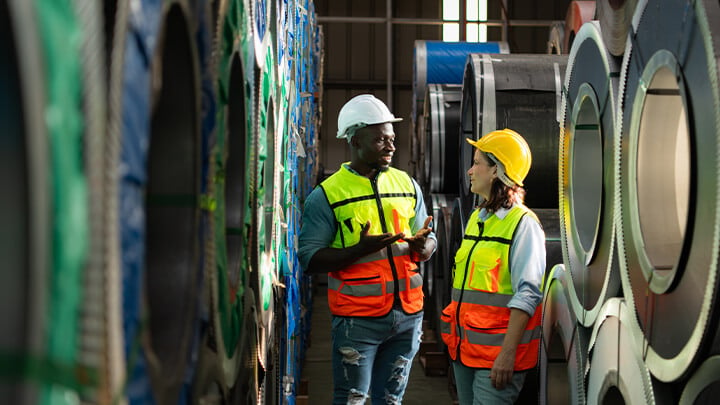 A team of young men and woman working in a warehouse