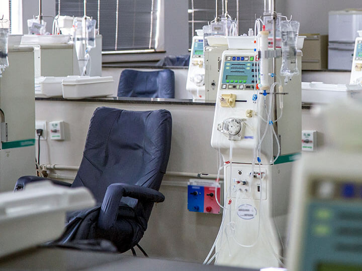 Medical room filled with Hemodialysis equipment and chairs