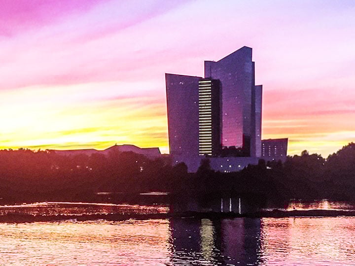 Beautiful sunset overlooking water and Mohegan Sun in Uncasville, CT in the background