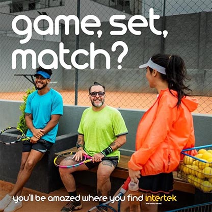 Players sitting at tennis court